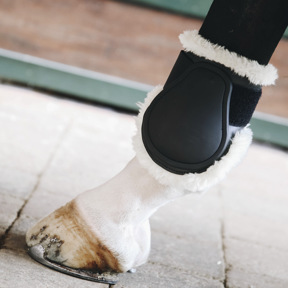 The Sheepskin Young Horse Fetlock Boots are the ideal choice for competing young horses. The Sheepskin Young Horse Fetlock Boots are the ideal choice for competing young horses.