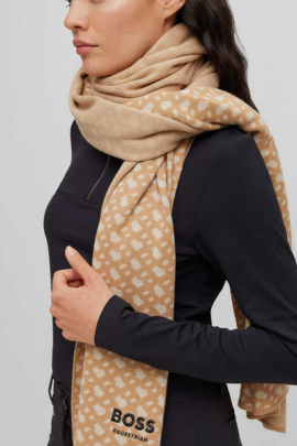 Ridershouse: BOSS EQUESTRIAN Naomi Monogram Cape in the color Beige black