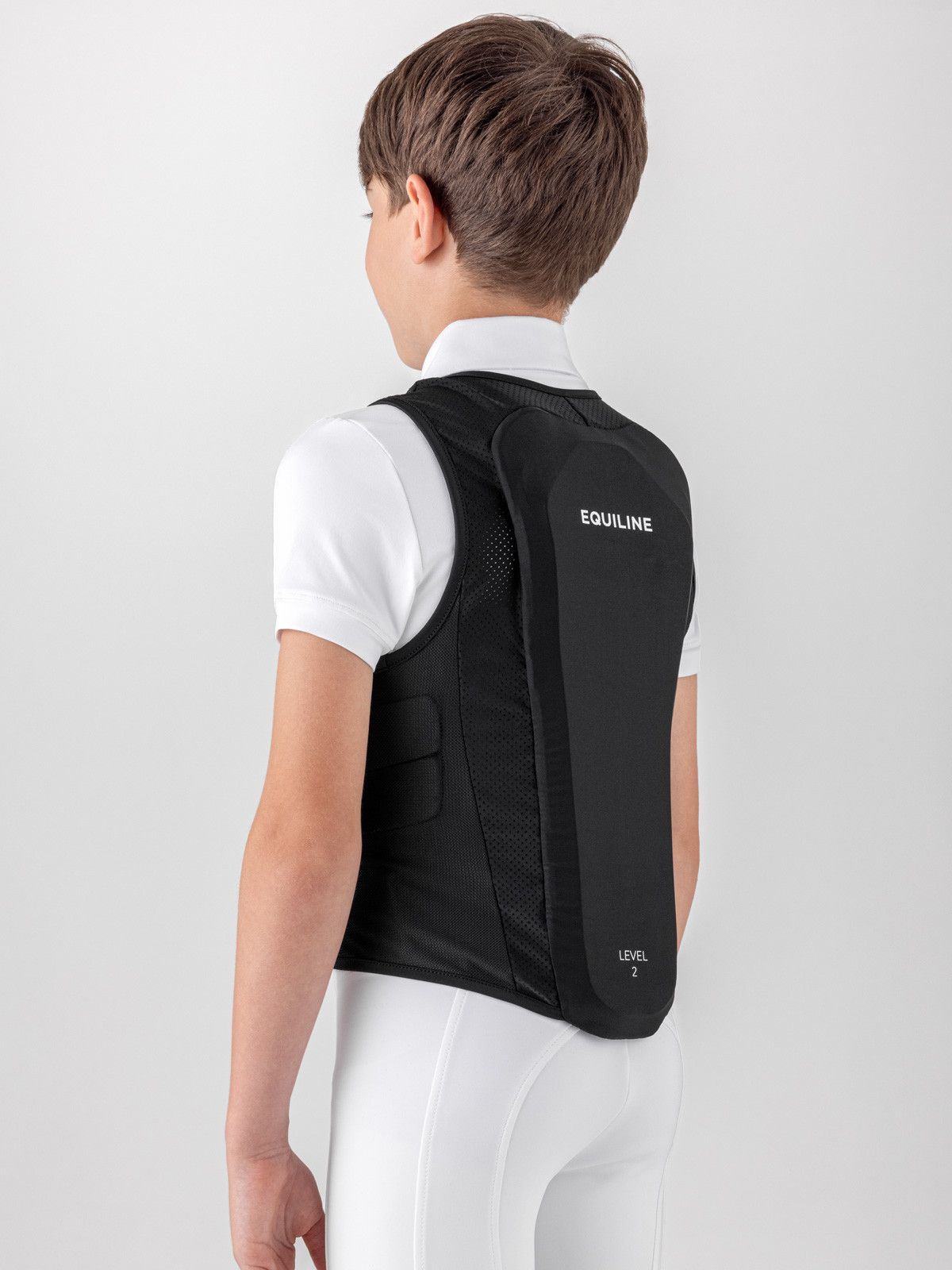 Equiline Rugbeschermer Xcudo Kind | Zwart Equiline Rugbeschermer Xcudo Kind | Zwart