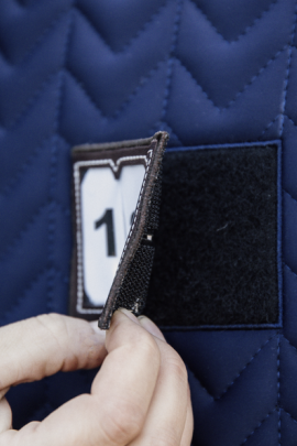 Saddle Pad with removable artificial leather patch which allows you to indicate your starting number