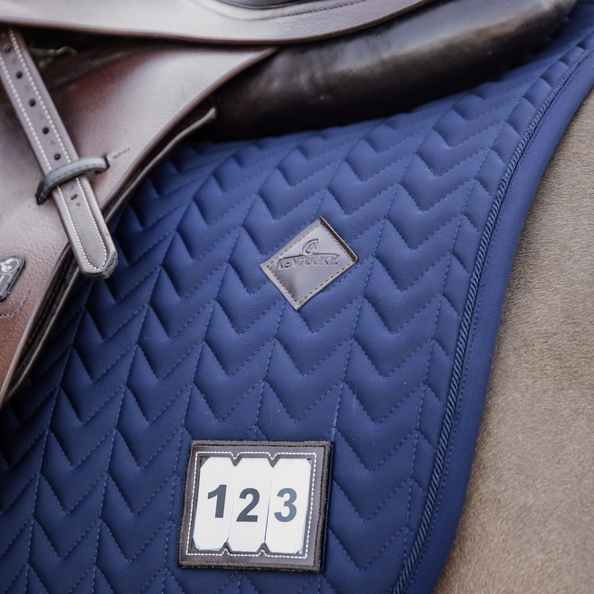 Saddle Pad with removable artificial leather patch which allows you to indicate your starting number Saddle Pad with removable artificial leather patch which allows you to indicate your starting number