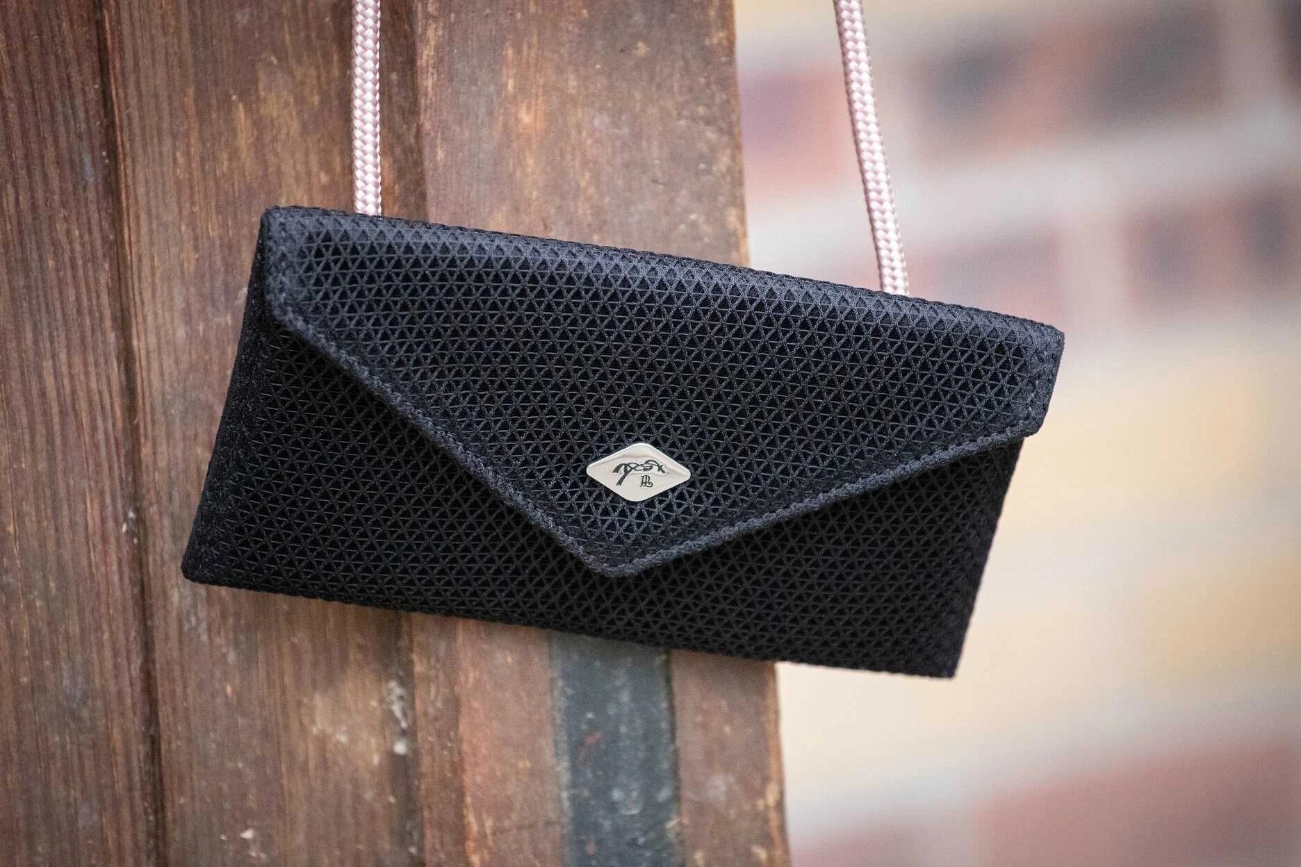 Penelope Leprevost mesh phone pocket belt | Shop now Penelope Leprevost mesh phone pocket belt | Shop now